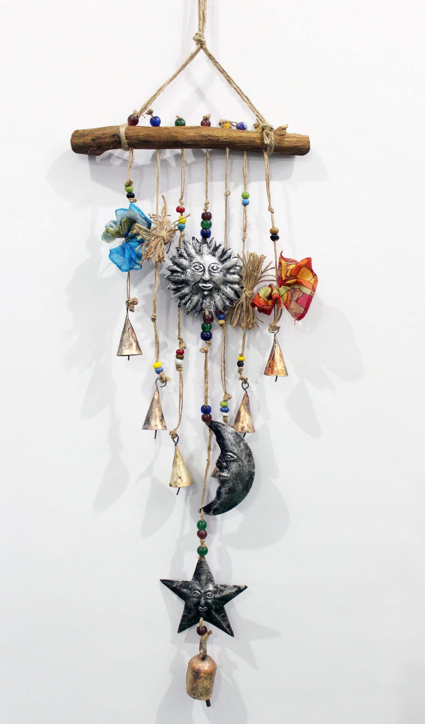 Enhance your garden with our rustic wind chimes made from recycled materials. Perfect for patio and outdoor décor. Assorted designs available!